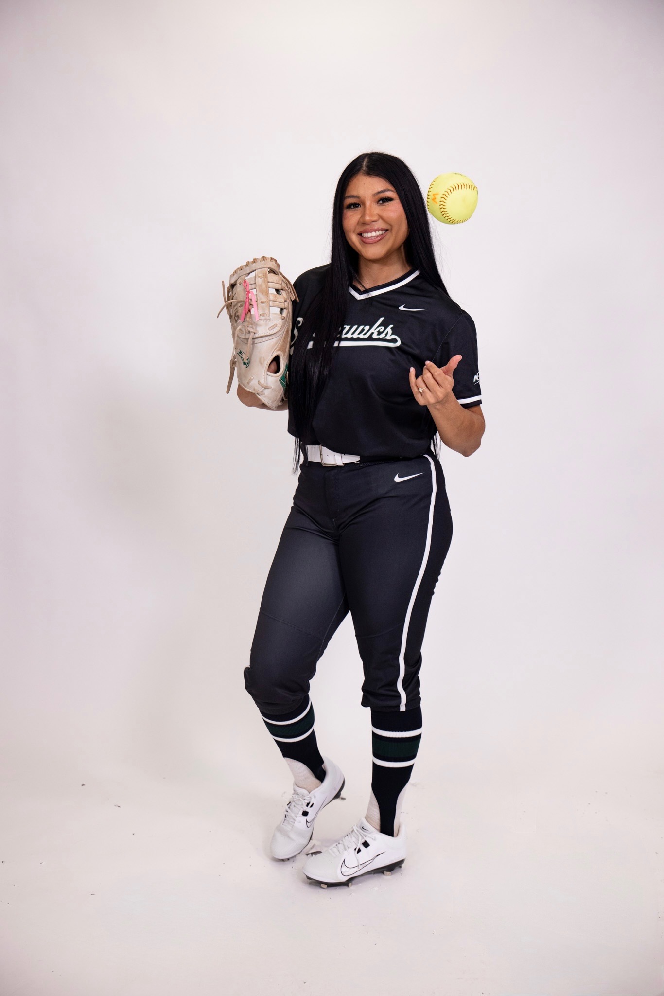 Geanice Morales with glove and softball